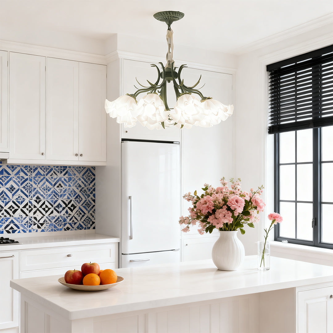 Vintage flower chandelier above a kitchen island, providing a charming and functional lighting solution.