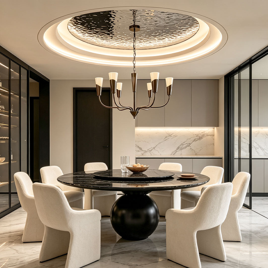 Vintage Italian chandelier above a round black dining table in a luxurious contemporary interior.
