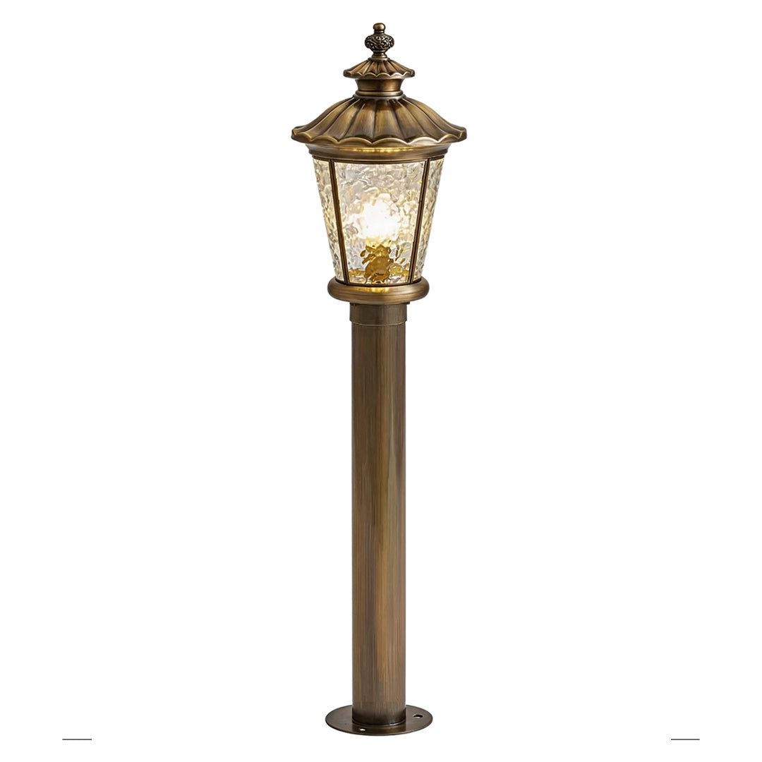 Vintage outdoor bollard light with antique bronze post and clear textured glass