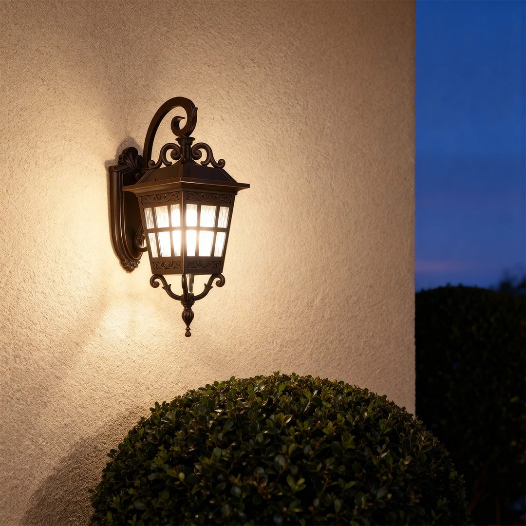 Vintage-style outdoor patio wall light illuminating a wall, warm and inviting exterior lighting