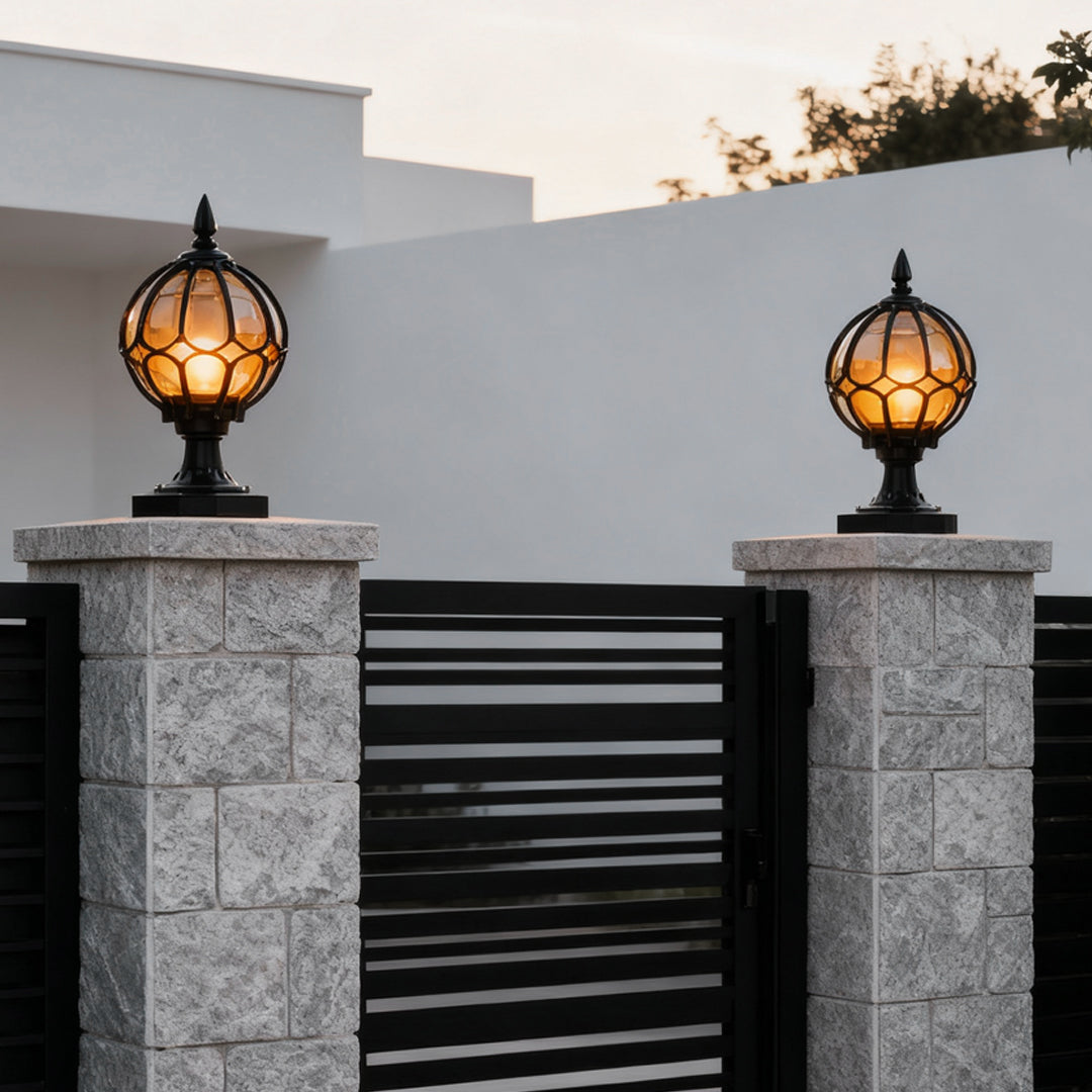 vintage outdoor pier mount post light with glass globe on the fences