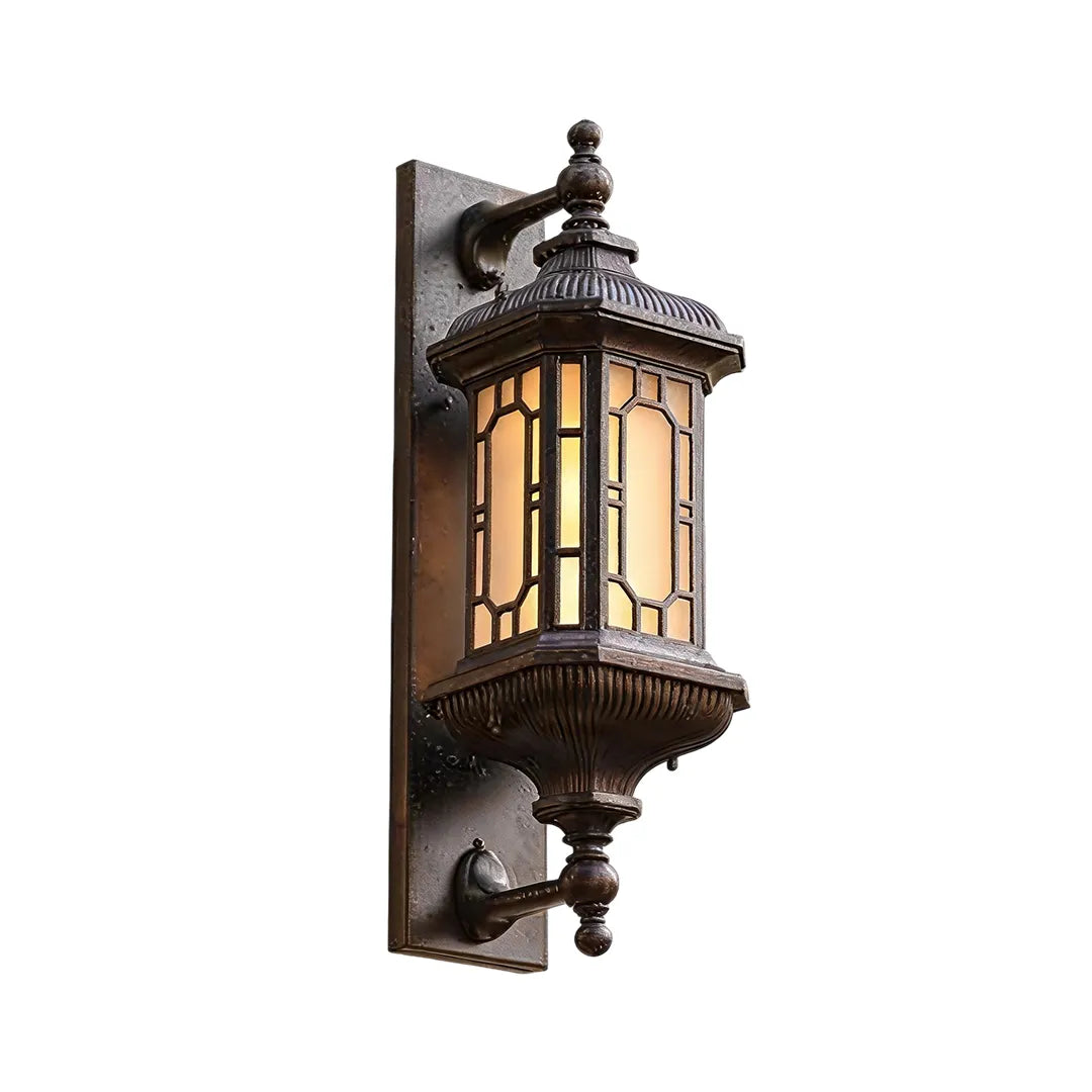 Vintage outdoor wall lantern product image with classic metal detailing and a warm illuminated glass shade.