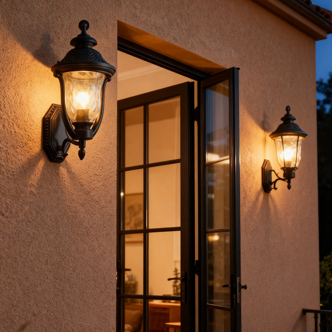 Vintage-style outdoor wall light beside a modern door, warm and inviting exterior lighting