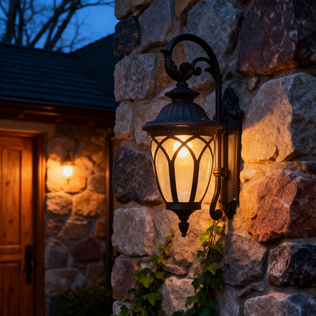 Vintage-style outdoor wall light on a stone wall, warm and inviting exterior lighting