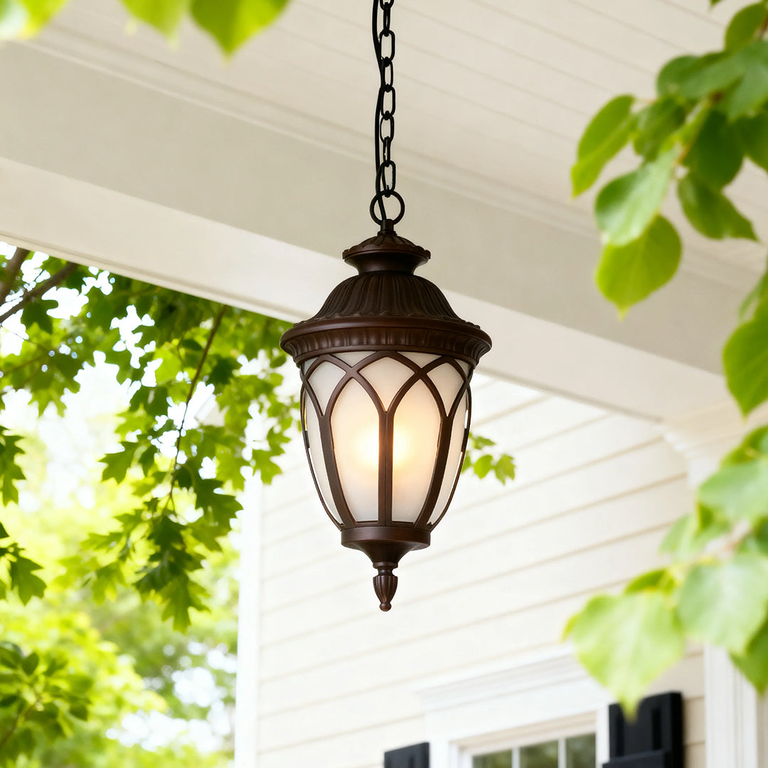 Vintage-style pendant outdoor light under a pergola, warm and inviting exterior lighting