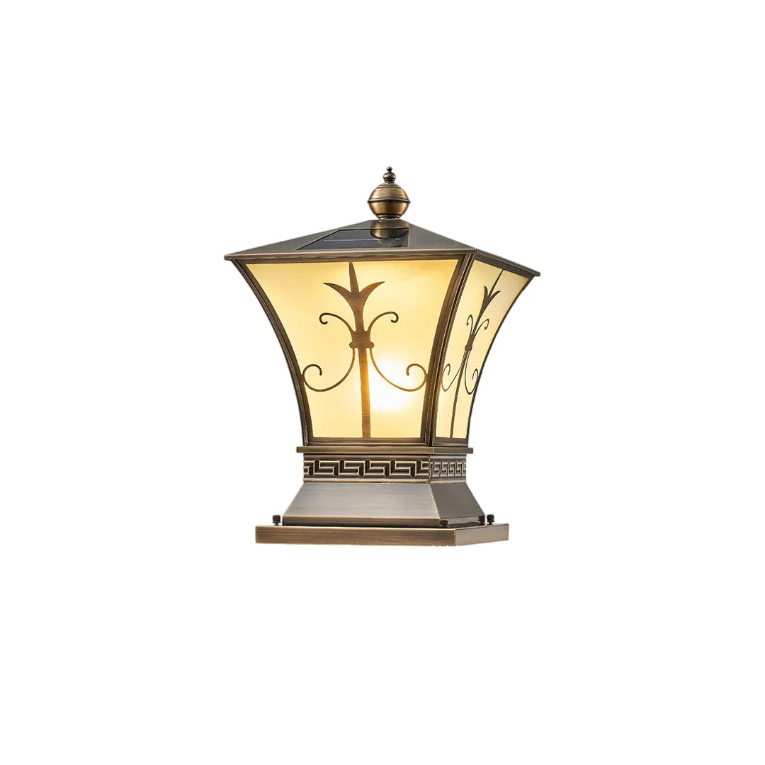 Vintage solar pillar lantern with antique bronze frame and warm decorative glass