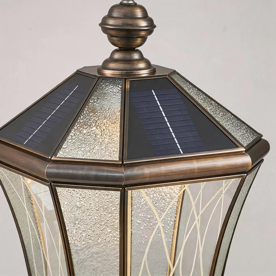 Vintage solar pillar lantern with integrated rooftop solar panels and bronze frame
