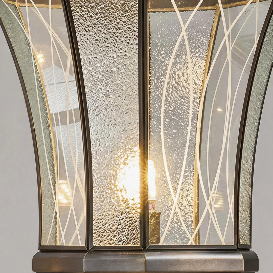 Vintage solar pillar lantern with textured glass and warm LED lighting detail