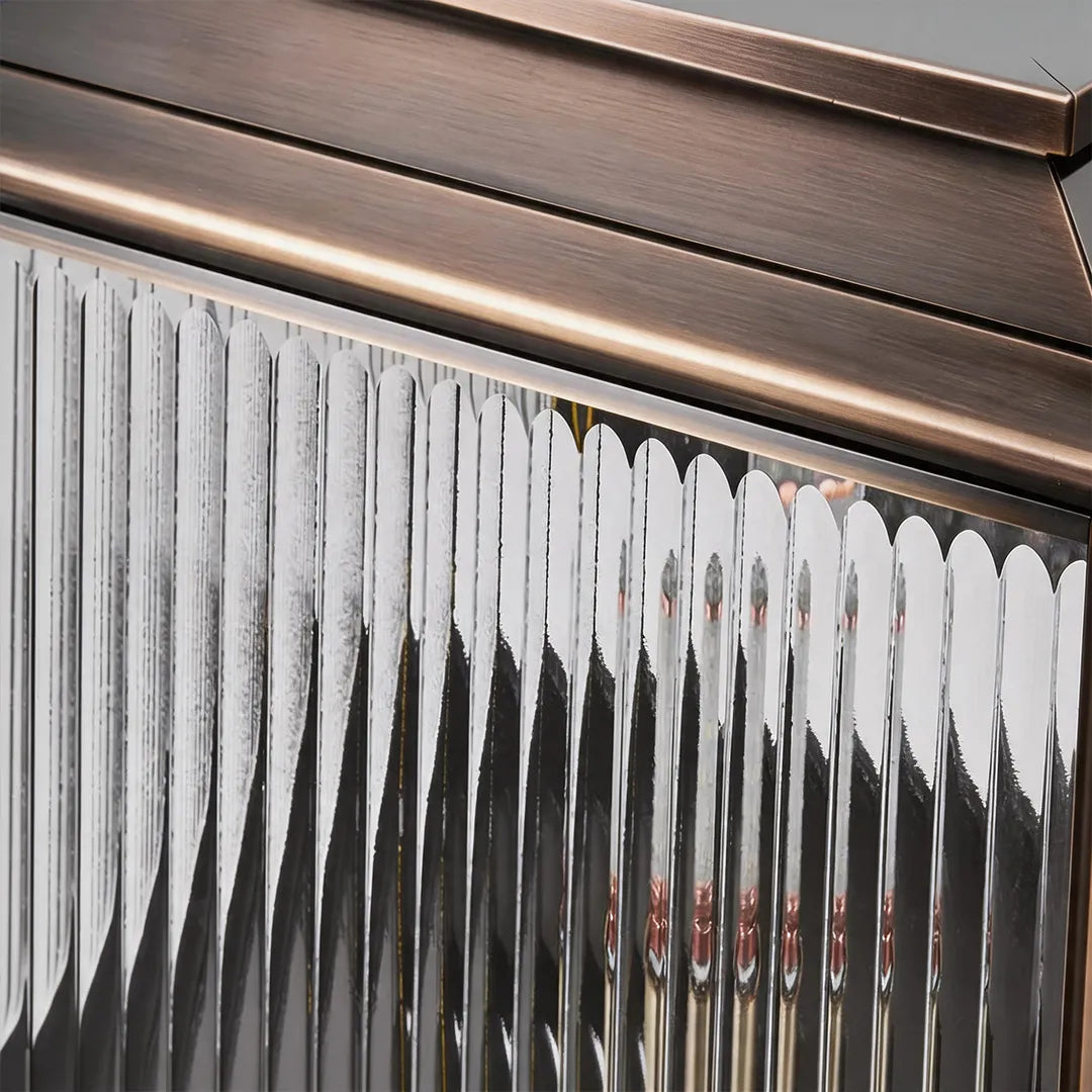Vintage solar pillar light with ribbed glass panels and bronze metal finish