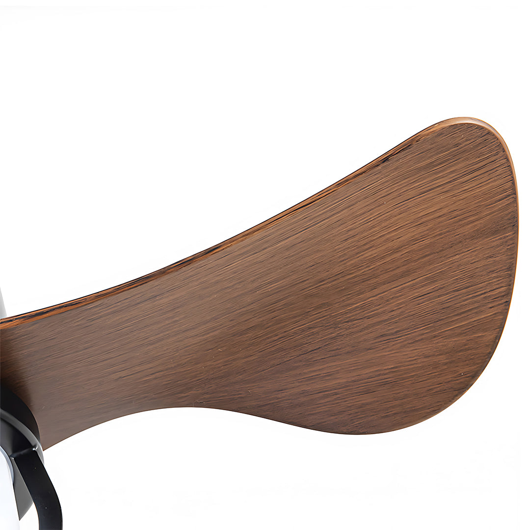 Close-up of vintage style ceiling fan blade showing natural wood grain texture and curved design