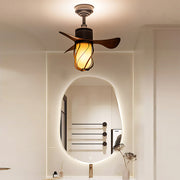 Vintage style ceiling fan with light illuminating entryway with warm glow and classic aesthetic