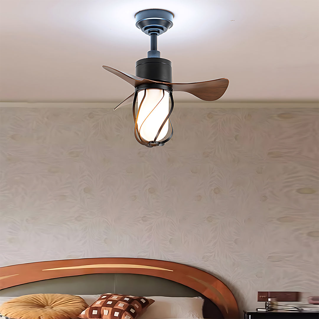 Vintage style ceiling fan with light installed in cozy bedroom with warm lighting and rustic decor