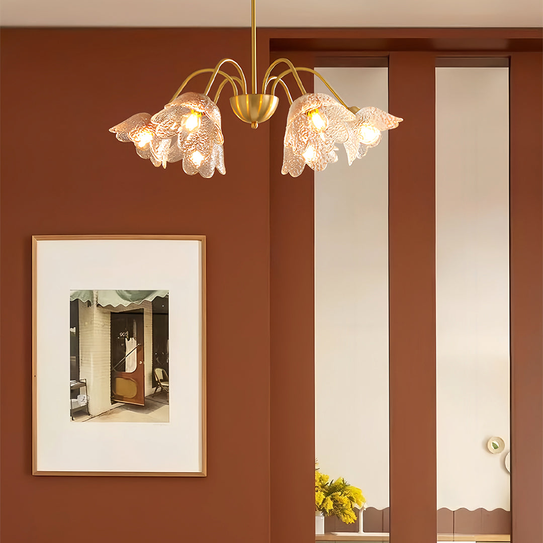 Vintage-style glass shades chandelier illuminating elegant room with neutral color palette