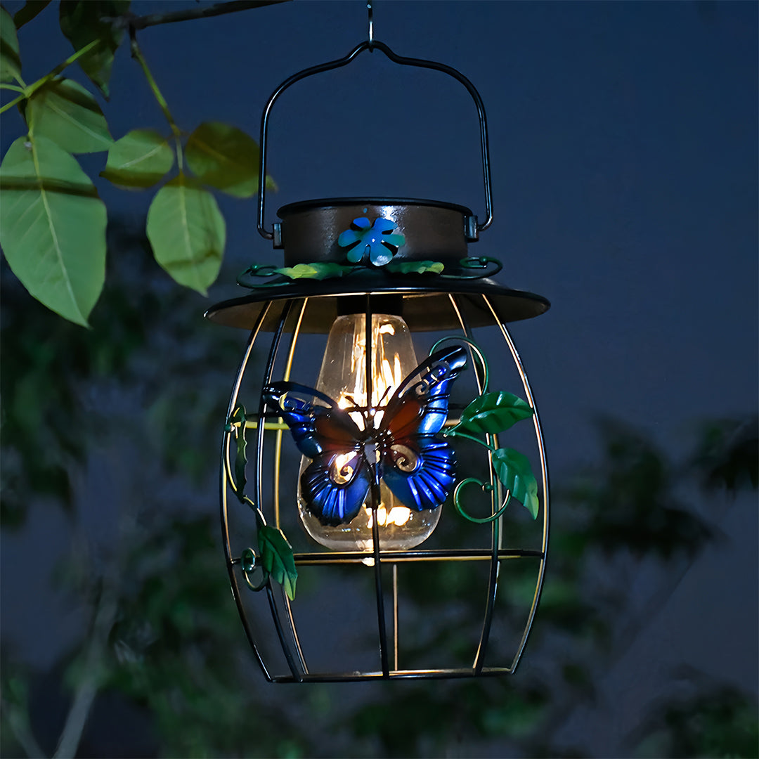 Vintage style iron outdoor lanterns with cut-out leaves and dark finish perfect for patio decor.