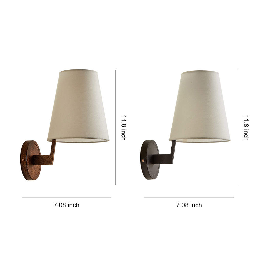 Vintage wall lights with tapered fabric shades and curved wooden arm brackets in natural wood finish