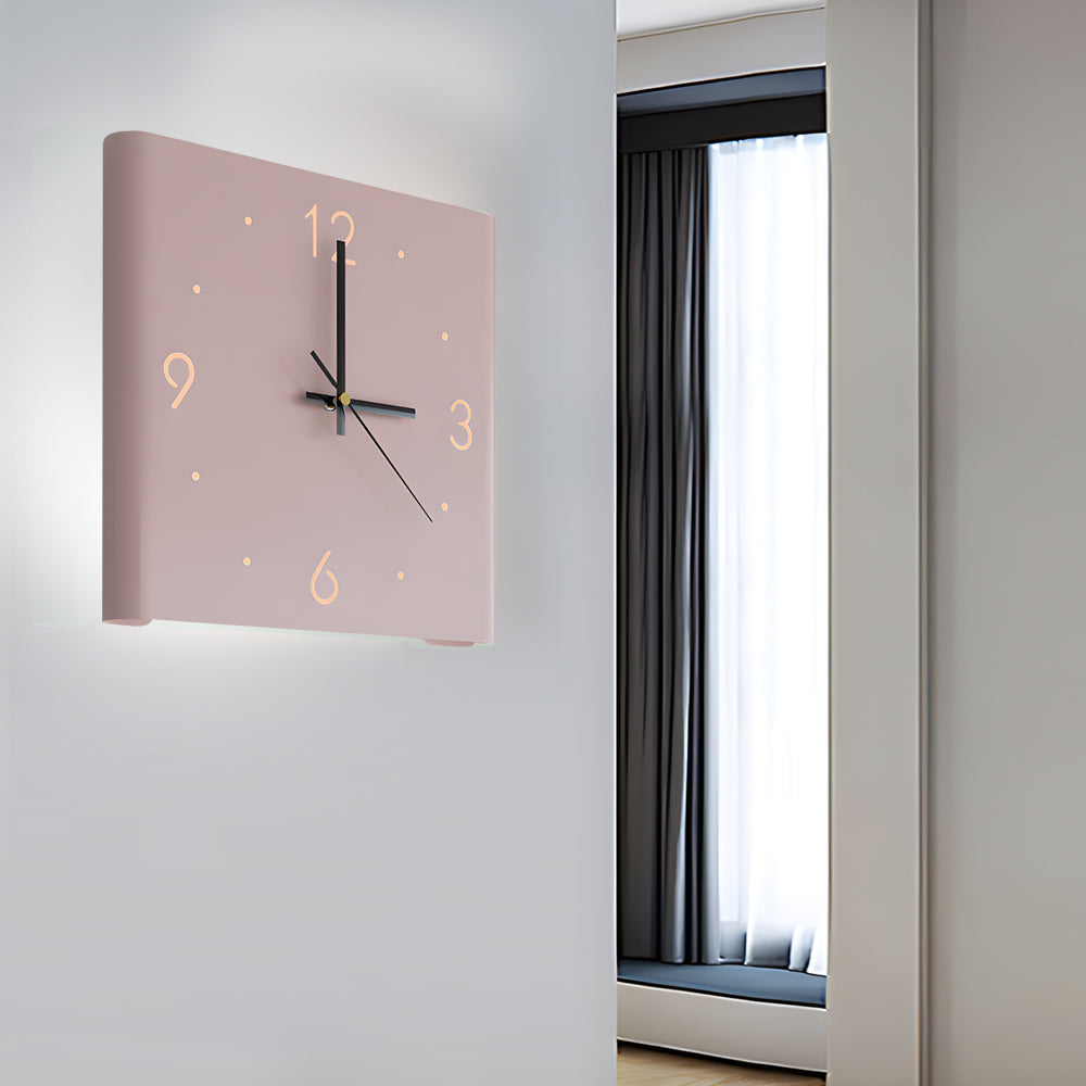 Wall clock lamp mounted on bedroom wall with warm backlight