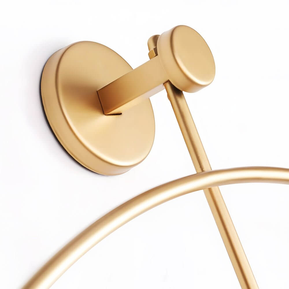 Wall clock with light showcasing its white and green floral clock face.