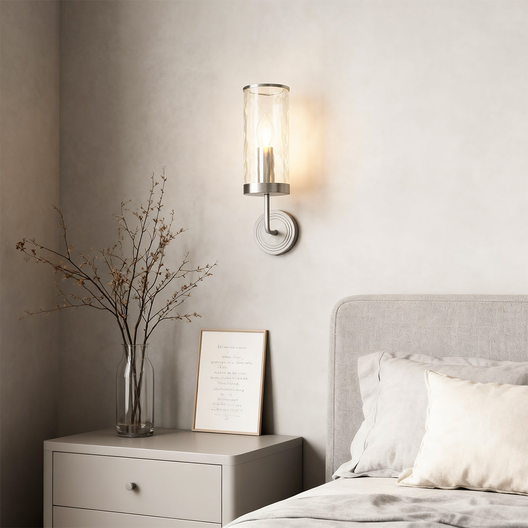 Wall glass light providing bedside illumination in serene bedroom with neutral tones