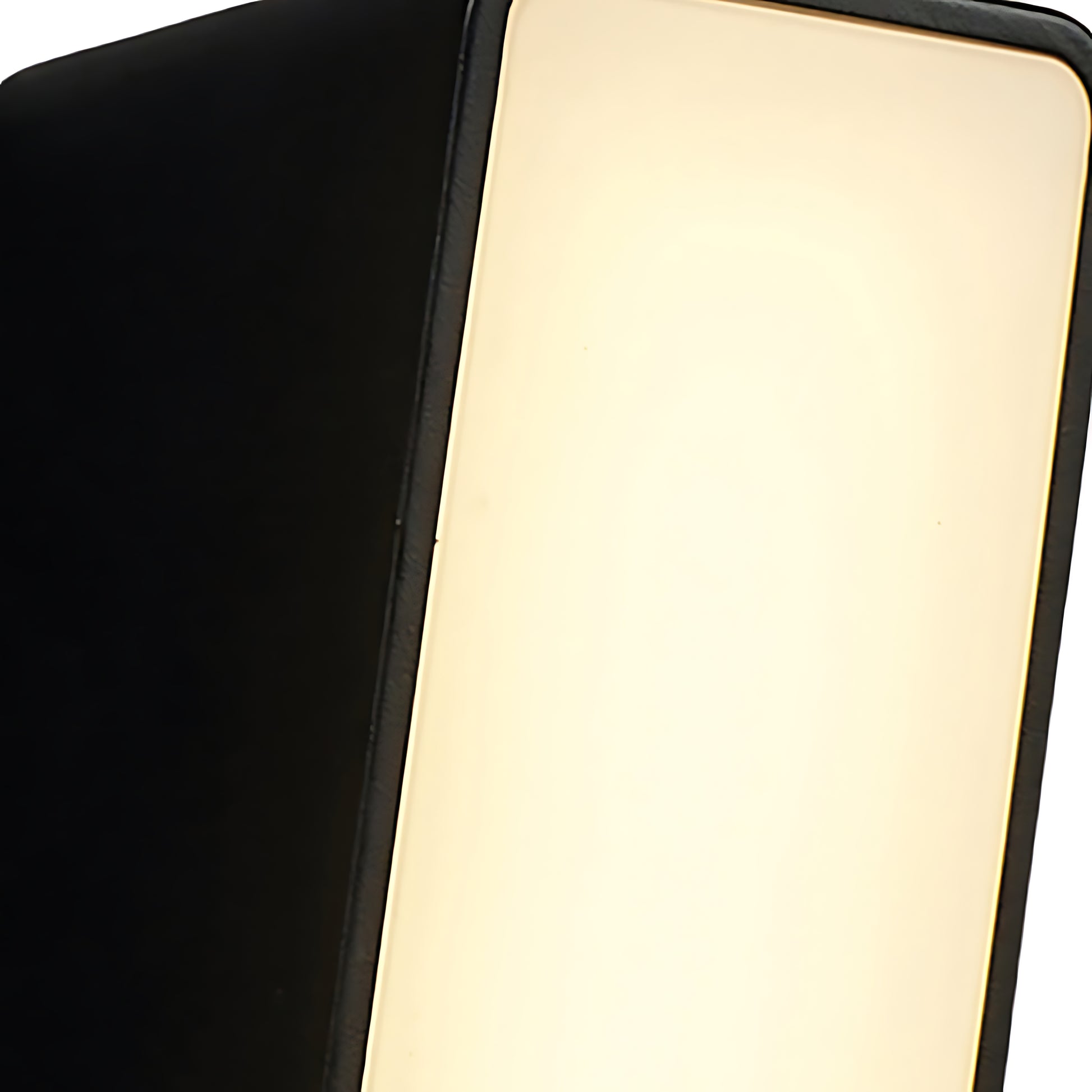 Side profile view highlighting the sleek curved edges of modern wall light fixture