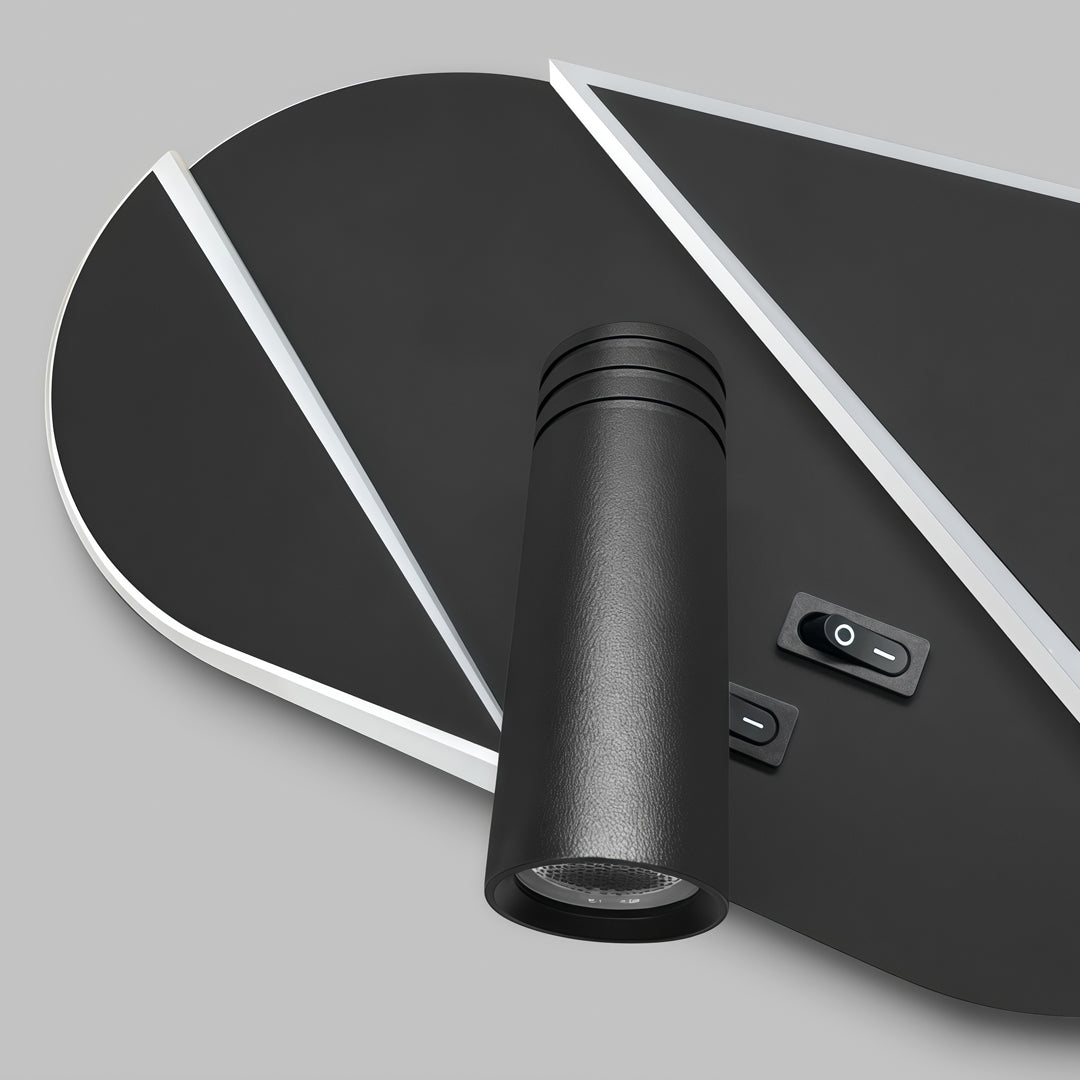 Detailed view of wall light with reading light showing matte black finish and integrated LED accents.