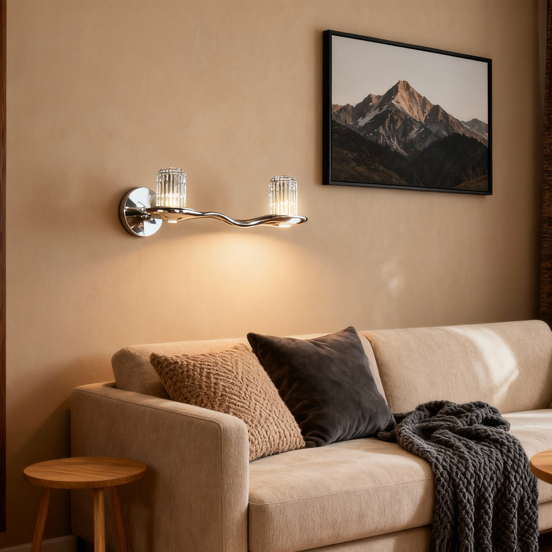 Wall lights with crystals creating cozy ambiance in living room beside sofa with warm earthy tones
