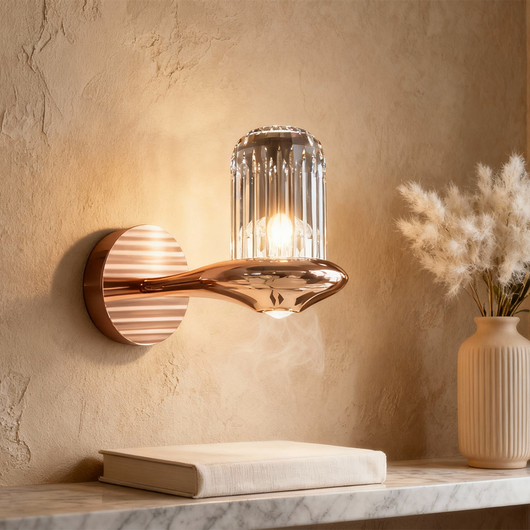 Wall lights with crystals mounted on textured beige wall creating warm ambient glow in rustic interior setting