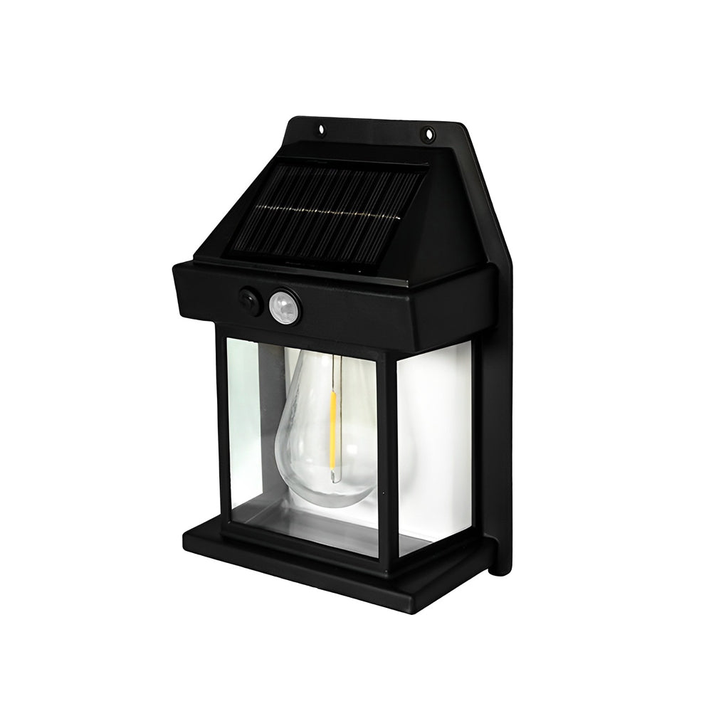 Wall mount solar lantern with a black finish and illuminated bulb for outdoor use.