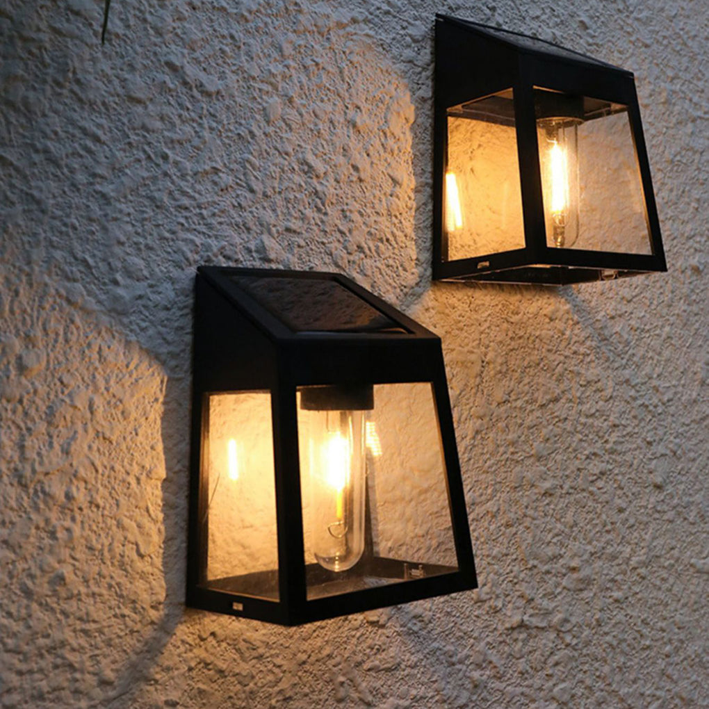 Wall mount solar lantern with a motion sensor and illuminated bulb for security.