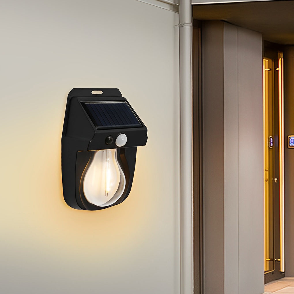 Wall mount solar lantern with a white finish and illuminated glass for pathways.
