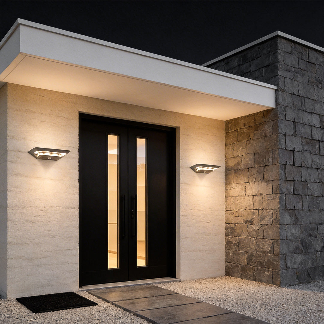 Wall mount solar lights outdoor with a modern design, mounted on a white wall.
