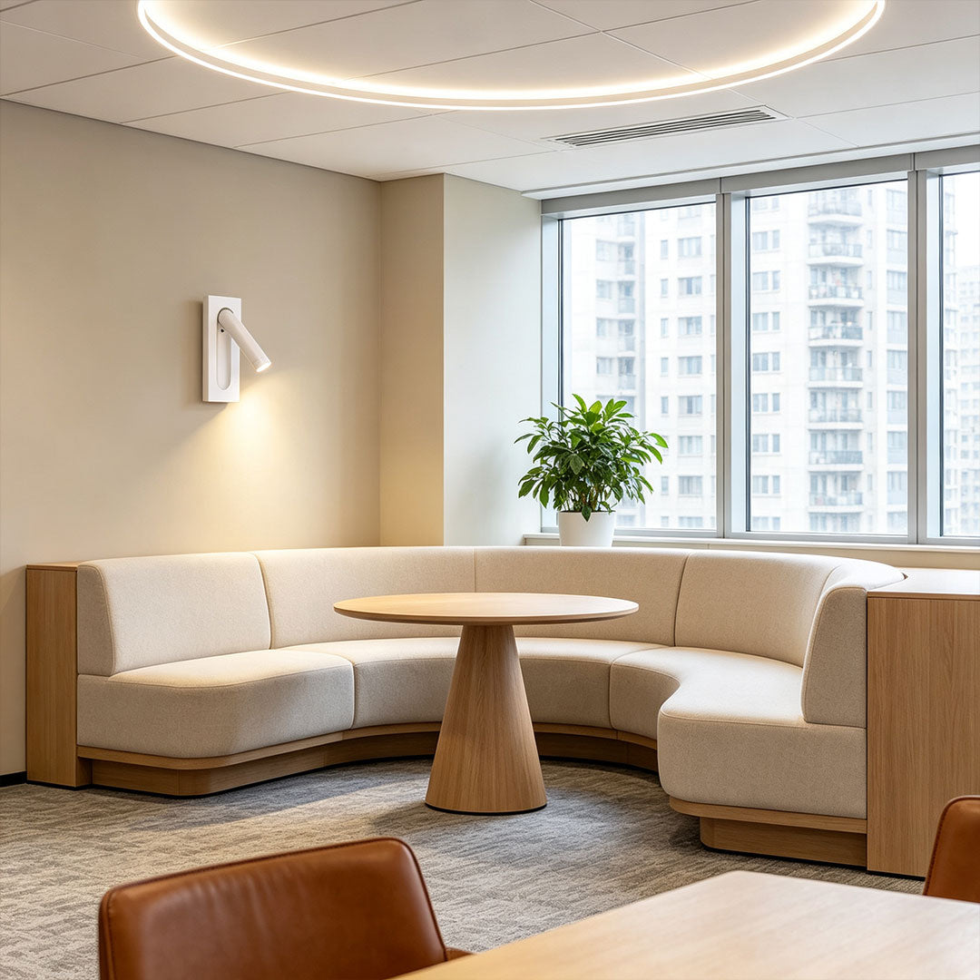 Elegant wall mount spot lights in modern lounge area with adjustable white spotlight and ambient lighting.