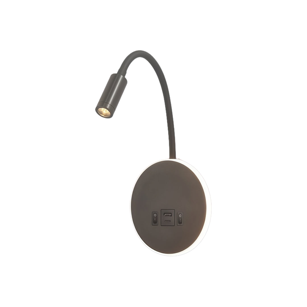 Black wall mounted bedside light featuring flexible gooseneck spotlight and integrated charging ports.