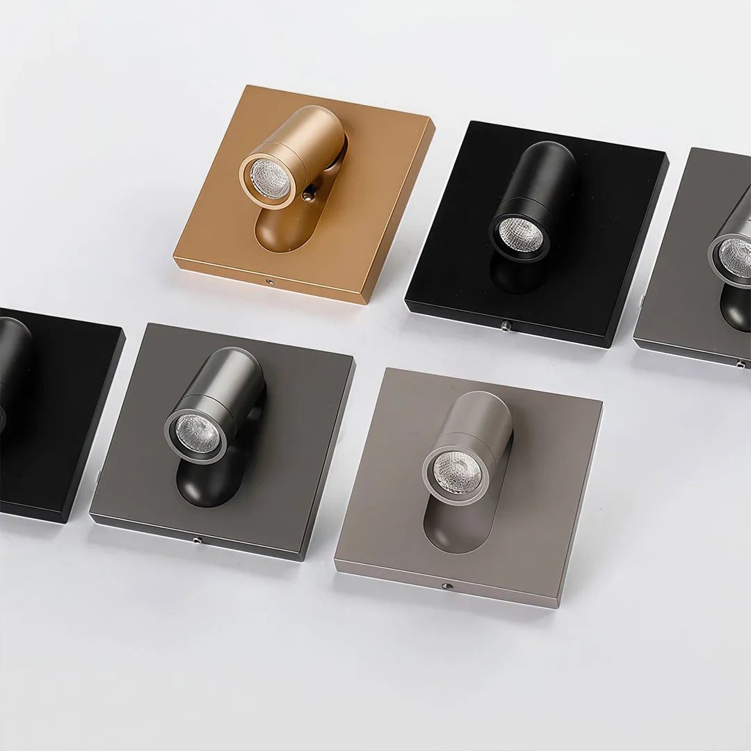 Wall mounted LED reading light color options displayed with black, gold, silver, and gray finishes.