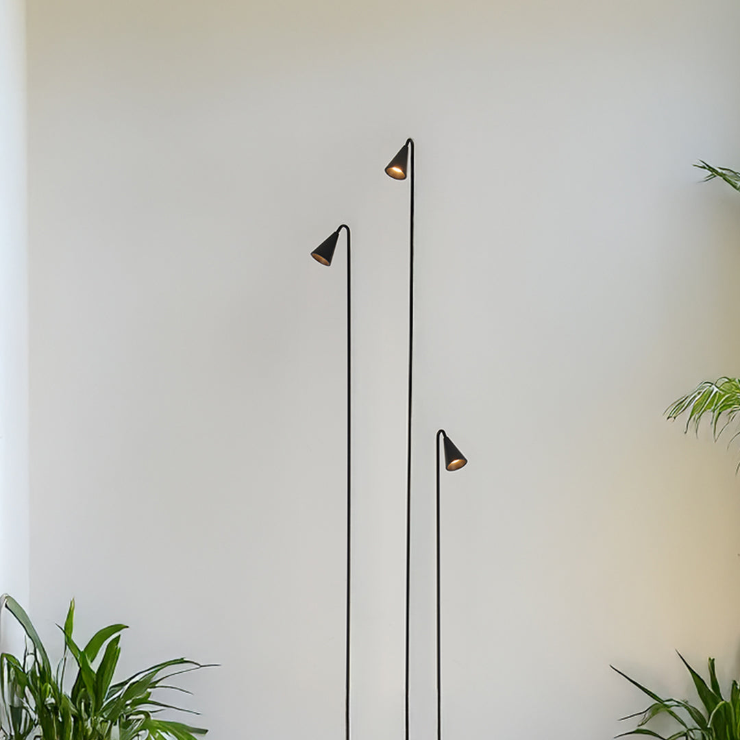 Modern white wall-mounted metal landscape lights providing clean architectural accent lighting for contemporary building design
