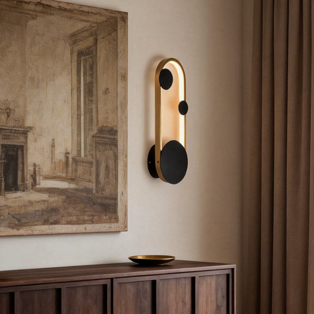 Wall mounted nightstand lights paired with wooden furniture, adding warm accent lighting to a calm and elegant bedroom setting.