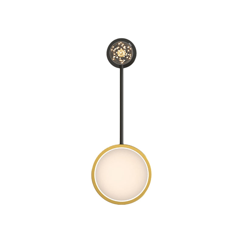 Wall pendant light in black and gold, displayed from an angled perspective.