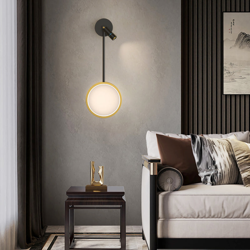 Wall pendant light with a gold interior, displayed against a minimalist gray wall.