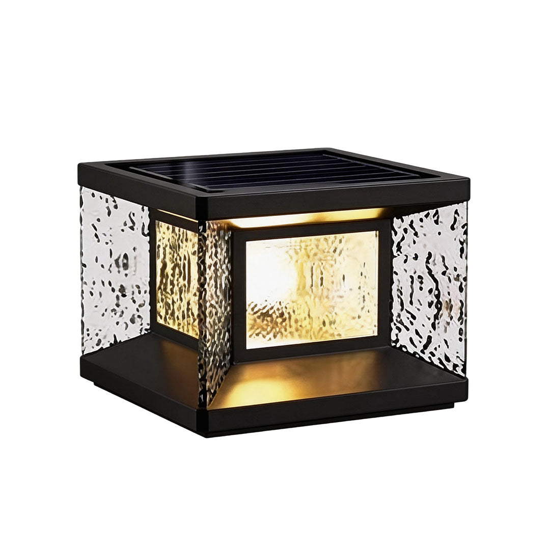 Wall pillar lights with a black frame and illuminated textured glass for residential entrances.
