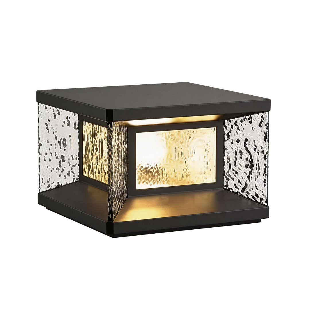 Wall pillar lights with a black frame and illuminated textured glass for ambient lighting.