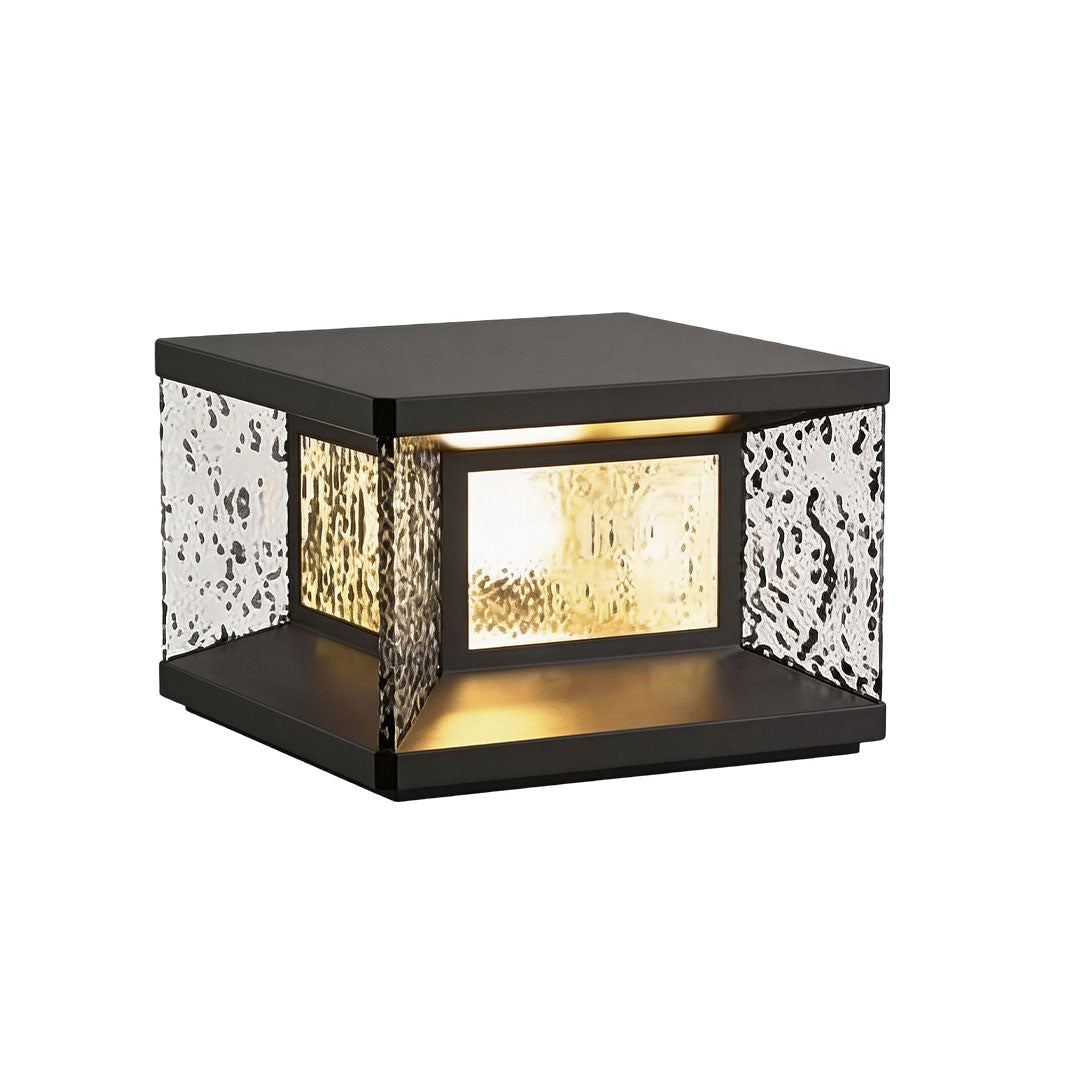 Wall pillar lights with a black metal frame and illuminated textured glass for outdoor spaces.