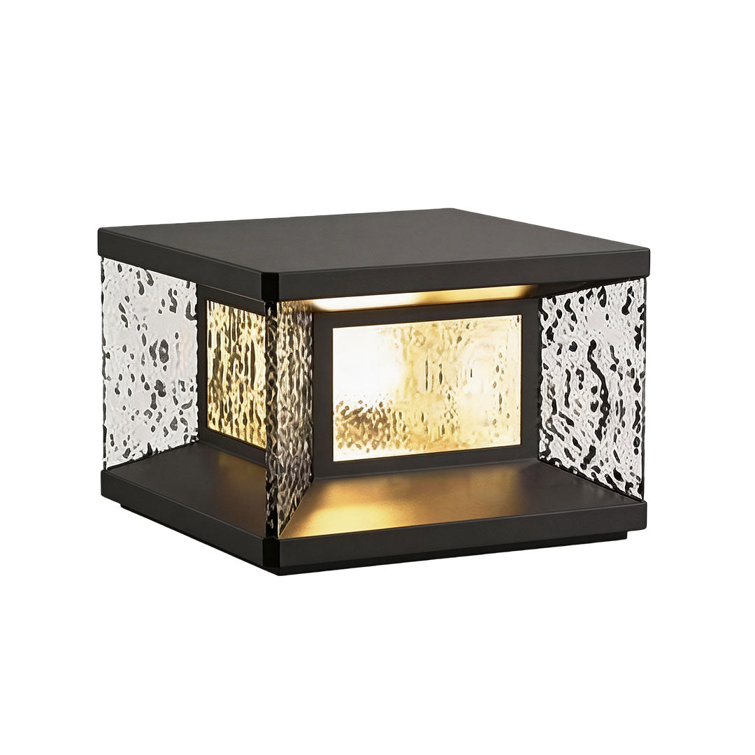 Wall pillar lights with a textured glass design and warm yellow light for garden illumination.