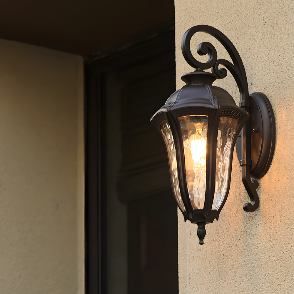 Wall sconce lantern with a glass panel design, providing ambient lighting.