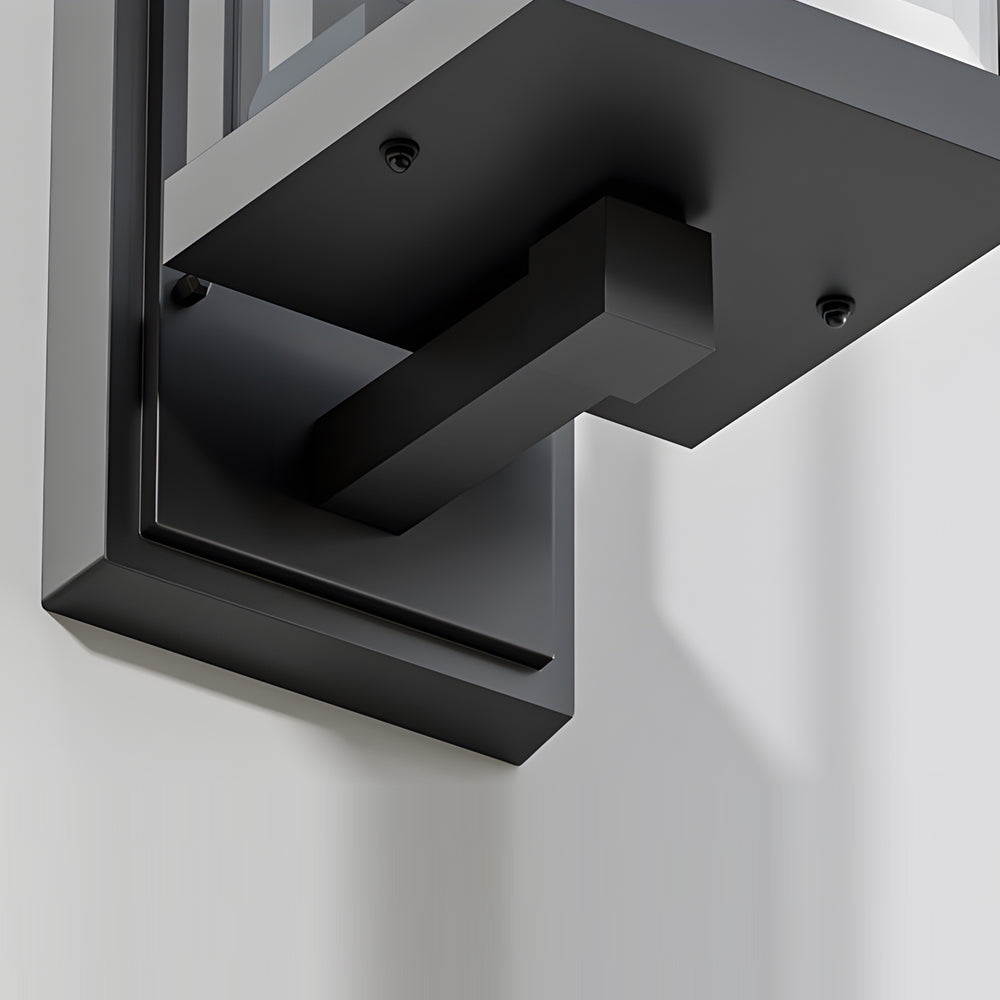 Close-up detail of wall sconce mounting bracket showing installation hardware and adjustment mechanism