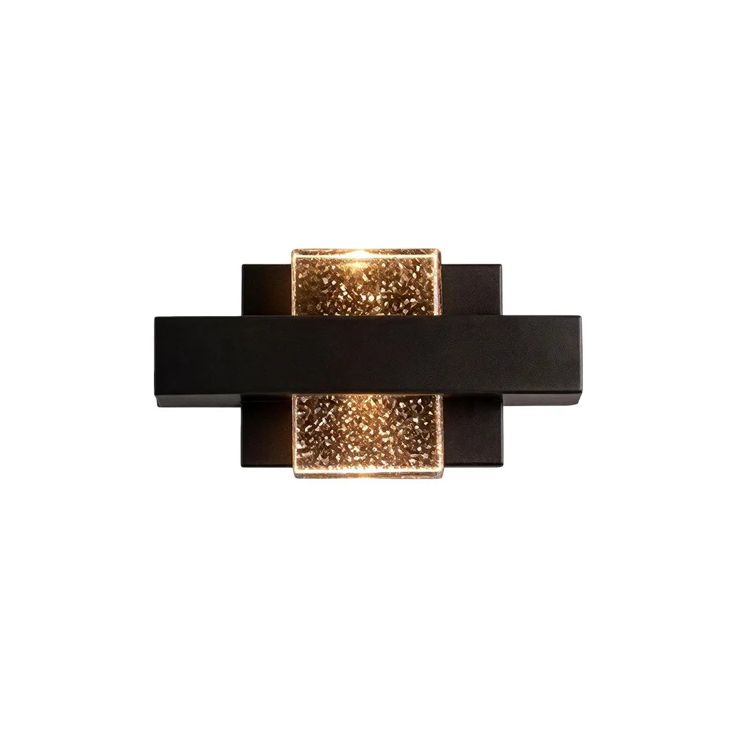 Wall sconce up and down light in a compact horizontal design with a black frame and sparkling crystal diffuser.