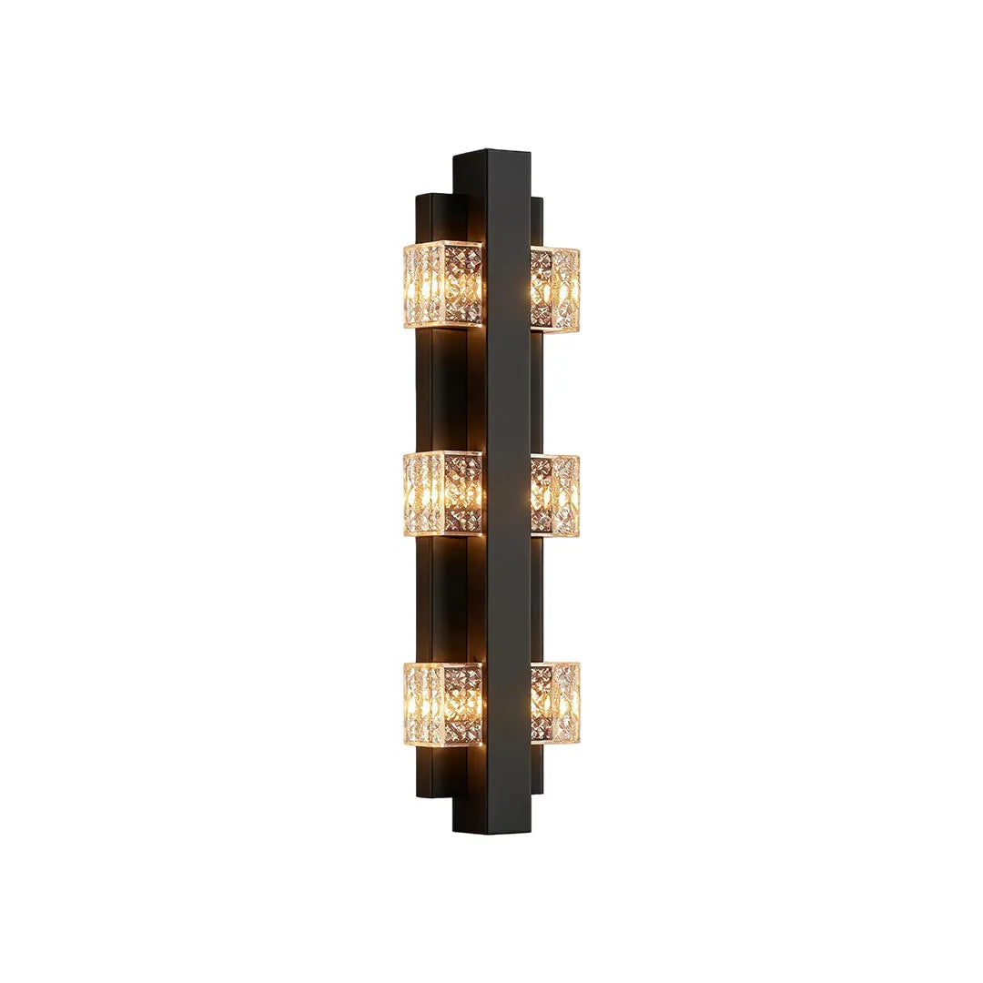 Wall sconce up and down light in a slim vertical configuration with stacked illuminated crystal accents.