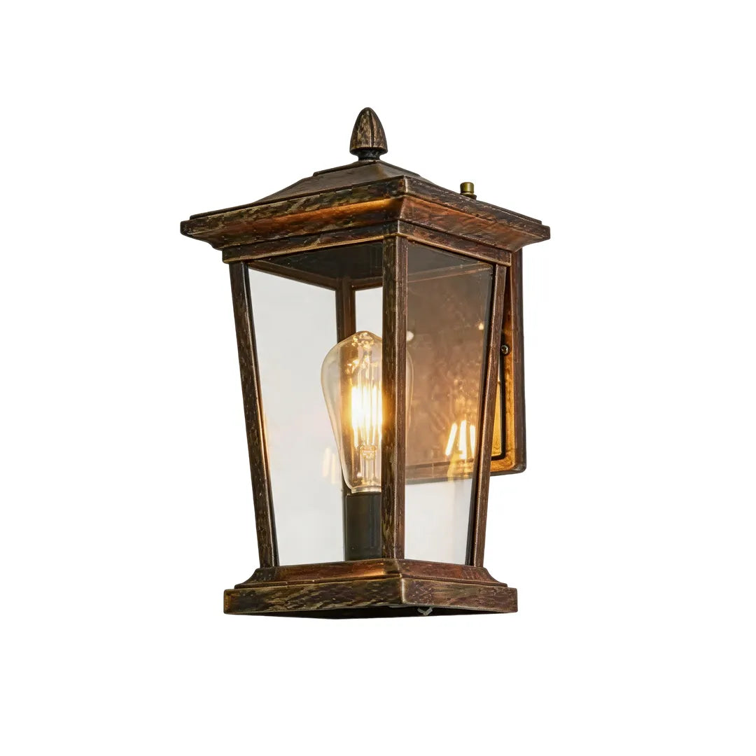 Wall vintage lights with an antique bronze finish, clear glass panels, and classic lantern styling.