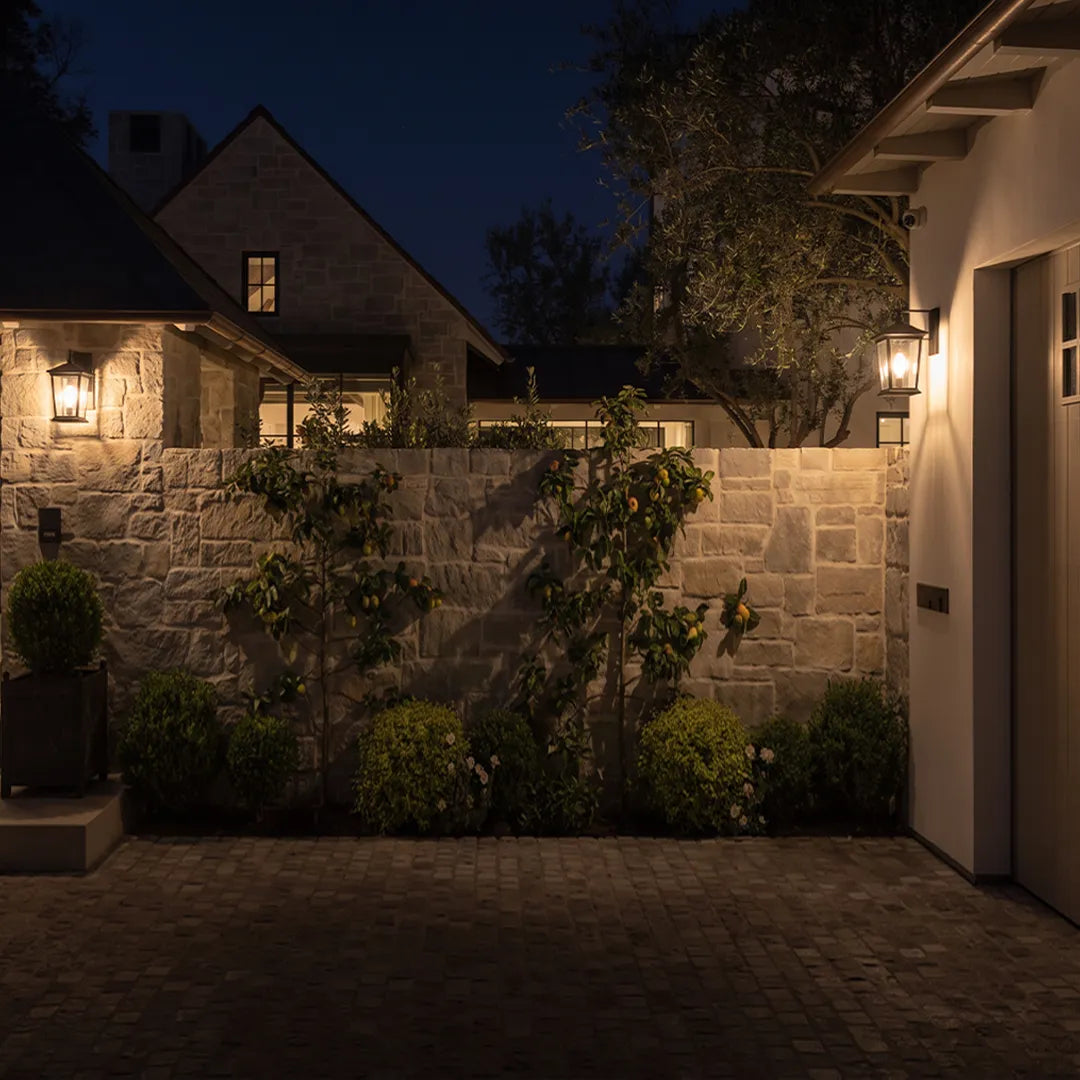 Wall vintage lights featuring a dark metal finish and decorative textured glass shade.