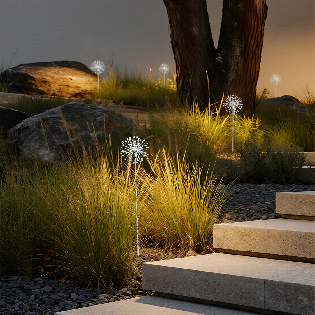 Warm ambient lighting from decorative starburst fixture showcasing beautiful landscape garden lights at dusk