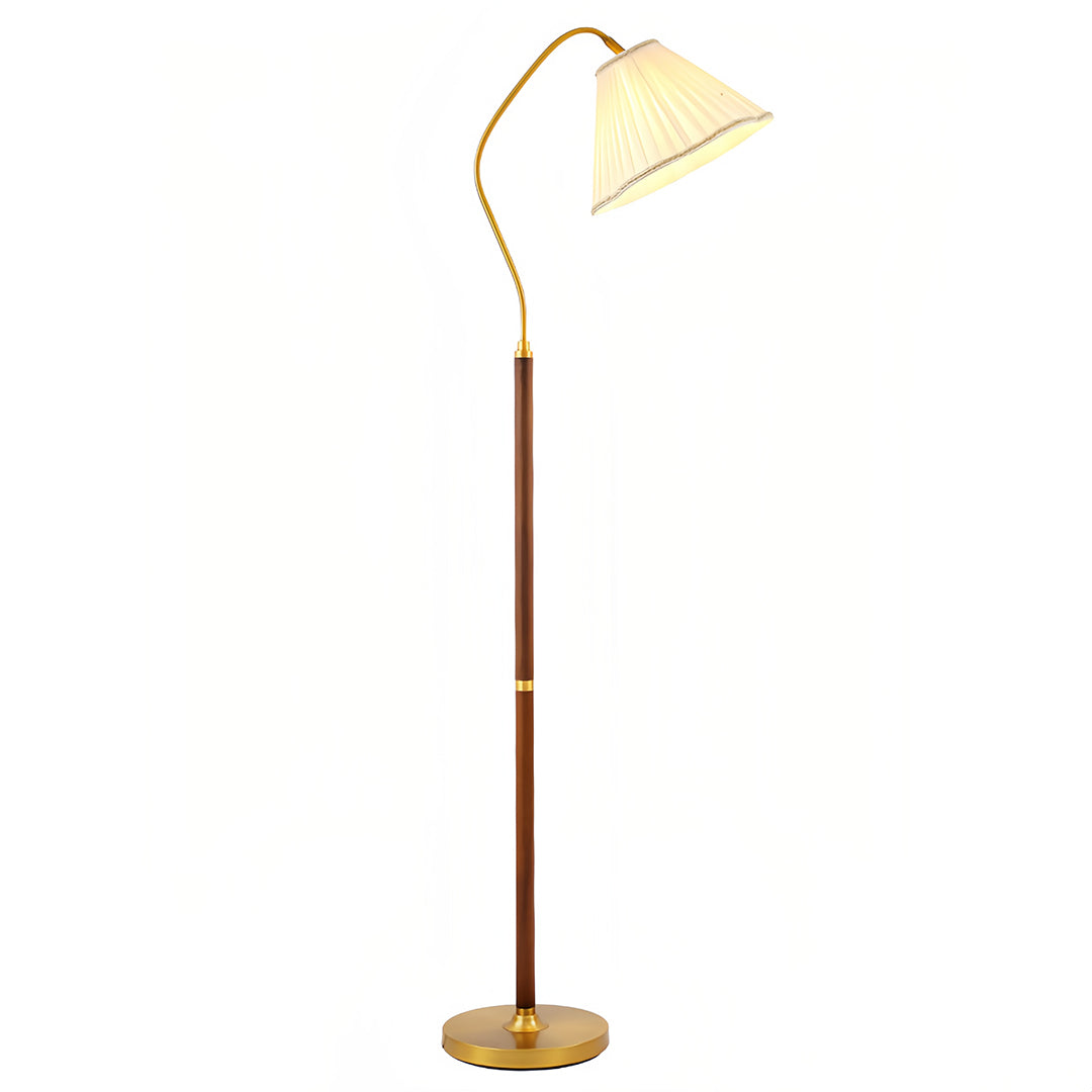 Stylish walnut floor lamp with warm brass finish and neutral fabric lampshade