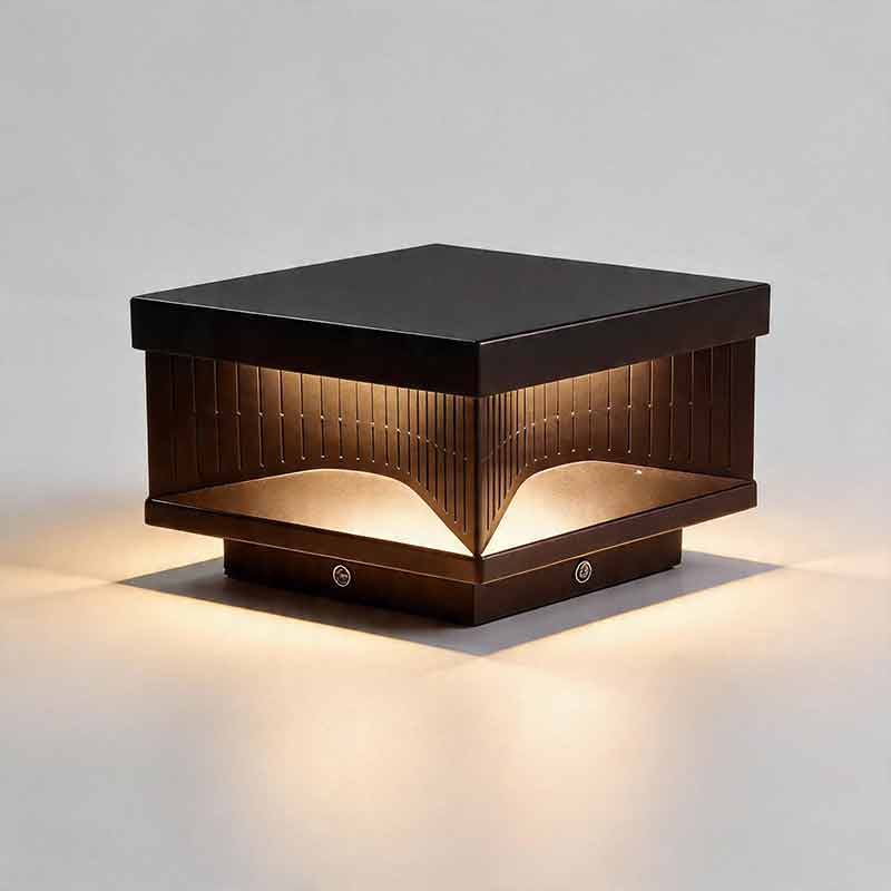 Warm glowing square outdoor pillar light with architectural arch design for luxury garden use.
